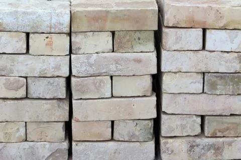 Close up shot of bricks stacked on each other Stockfoto's