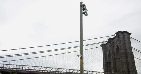Close Up Shot Of Brooklyn Bridge With A Helicopter Flying over USA Stock Footage 110509624