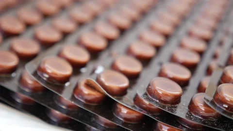 Close shot of brown color tablet packet Stock-Footage 147699403