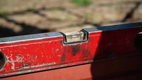 Close up shot of Bubble Level Tool. Leveling tool on construction site Video stock 258645593