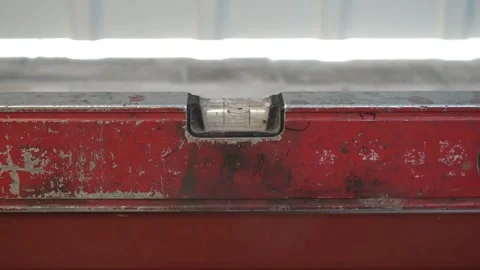 Close up shot of Bubble Level Tool. Leveling tool on construction site Video stock 261283693