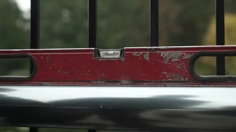 Close up shot of Bubble Level Tool. Leveling tool on construction site Video stock 261283694