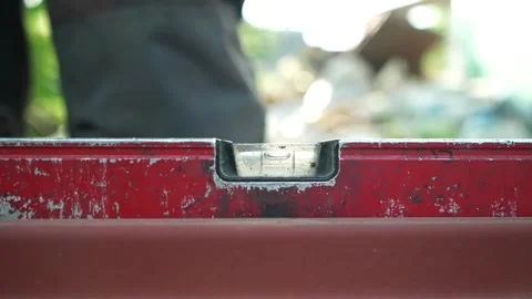 Close up shot of Bubble Level Tool. Leveling tool on construction site Video stock 261283875