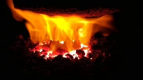 Close-up shot of burning coal fire in a fireplace Stock Footage 162753560