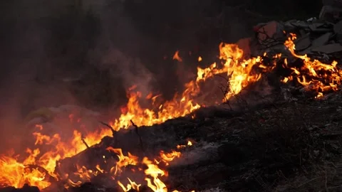 Close shot of burning waste causing air pollution Video stock 150714762