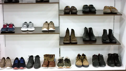 A close up shot with a camera going from the bottom to the top of a range of men Stock Footage 135770488