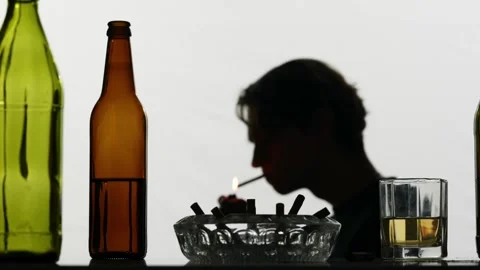 In the close up shot, the camera showing empty, dissipated, glass bottles with Stock Footage 252407046