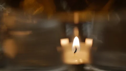 Close up shot of the candle flame. The image is blurred Stock-Footage 102985399