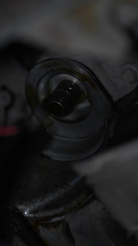 Close up shot of car engine oil filter housing thread. Stock Footage 343756246