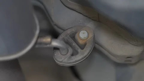 Close up shot of car muffler rubber hanger mount insulator. Stock Footage 343756775