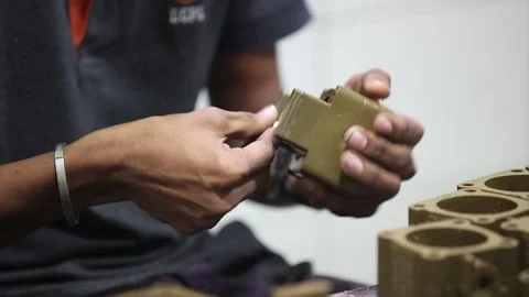 Close up shot of casting part clean are doing. Industrial safety first concept Stock Footage 297743790