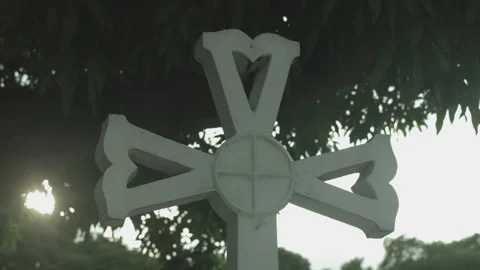 Close up shot of a cemetery cross Stock Footage 139999035