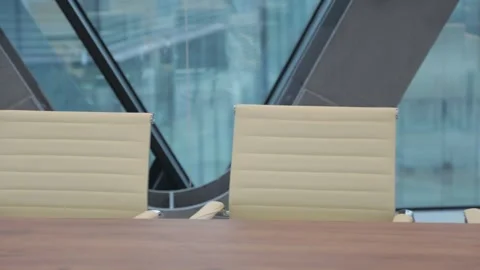 Close up shot of chairs in modern empty office Stock Footage 302473422