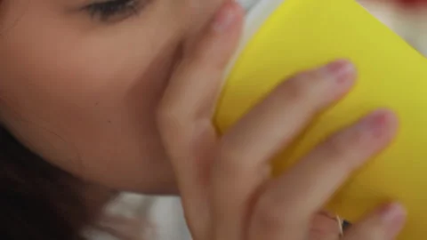 Close shot of cheerful student at cafe. Intimate scene capturing young woman Stock Footage 329889746