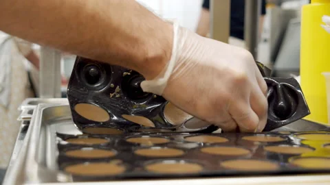 Close-up shot of a chef hands in gloves of preparing delicious chocolate jelly Stock Footage 150962112