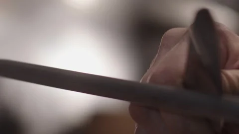 Close shot of a chef sharpens a knife Stock Footage 172073626