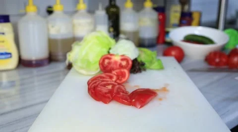 Close Up Shot Of The Chef's Hands - He Cuts Tomatoes Stock Footage 54924830