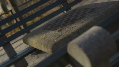 Close up shot of Chess Table In Park with chairs outdoors during day time Vídeo Stock 208753450