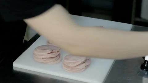 Close up shot the Chief lays ham Stock Footage 65806142