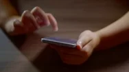 Close Up Shot Of Child Hands Holding A Big Smartphone. Stock Footage