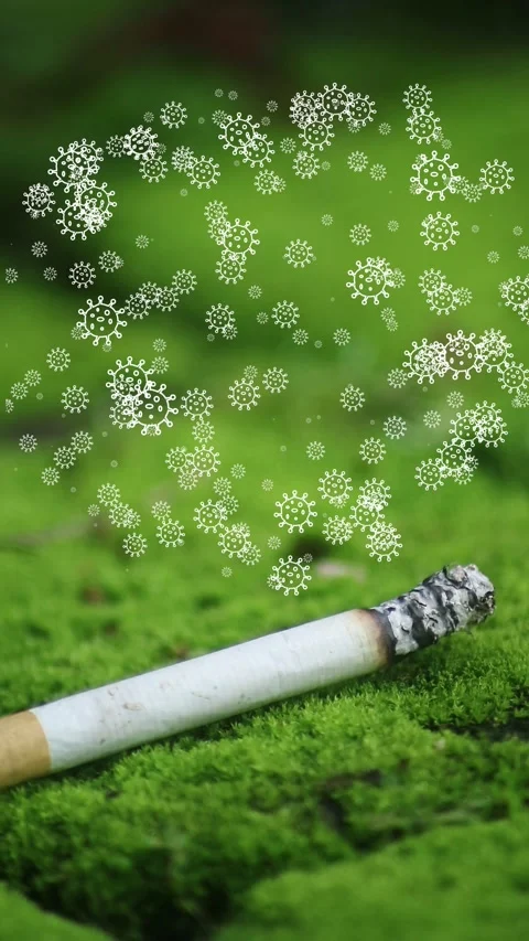 Close up shot of cigarette butt with virus symbol Stock Footage 300062409