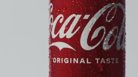 Close up shot of classic Coca-Cola red can on the white background Stock Footage 242419856