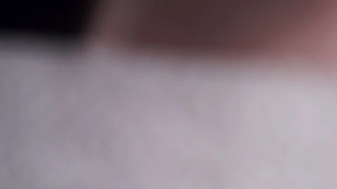 Close up shot of cleaning black mirror with water with white wipe Video stock 111570537