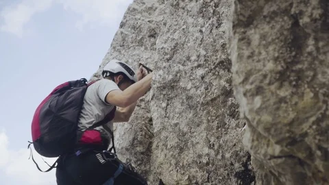 Close up shot of climber climbing in the wall Stock Footage 98696545