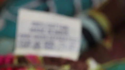 Close up shot of a clothes marker - Made in India Stock Footage 38687240
