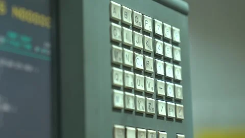 Close Up Shot Of A CNC Machine Programmer Controlling The Machine By Pushing 스톡 동영상 332065794