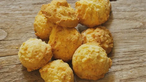 Close up shot of coconut biscuits rotating on a plate. Video stock 105393277