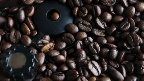 Close up shot of coffee beans grinding. Stock Footage 196220683