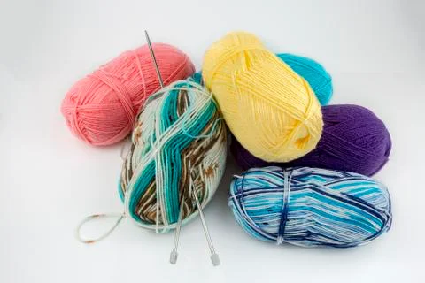 Close up shot of colored wool yarn balls as background Stock Photos
