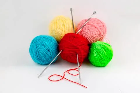 Close up shot of colored wool yarn balls as background Stock Photos