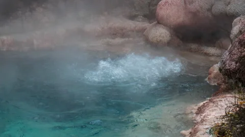Close up shot of colourful Geothermal pool bubbling Stock Footage 250134490