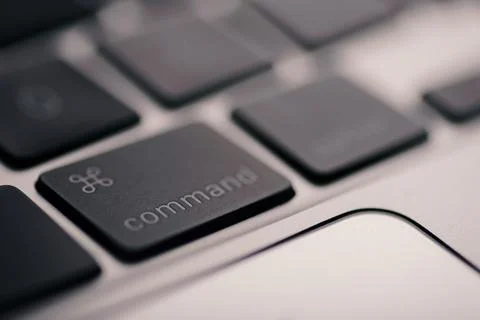 Close up shot of Command button of an apple brand macbook. Stock Photos