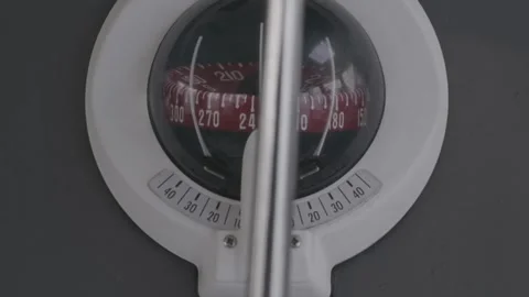 Close-up shot of a compass of a sailing boat. Sailing boat navigation. Stock Footage 225726816