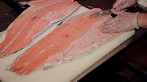 Close up shot the cook cut fresh red fish Stock Footage 65507384