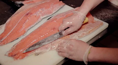 Close up shot the cook cut fresh red fish Stock Footage 65507403