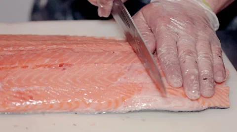 Close up shot the cook cut fresh red fish Stock Footage 65507717