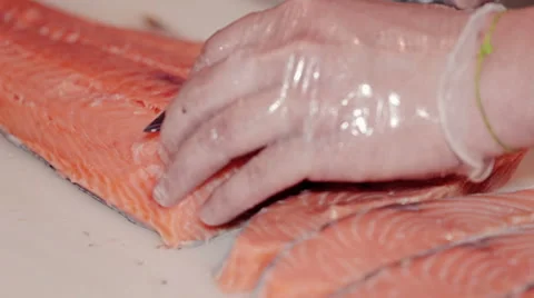 Close up shot the cook cut fresh red fish Stock Footage 65507744