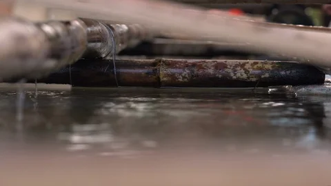 Close up shot of cup and water for shinto water purification ritual outside temp Видео 100776901