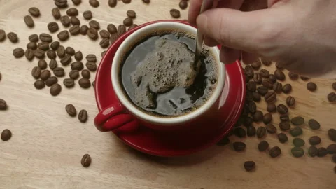 Close up shot cup coffee, side view from above of . Mug with coffee the hand of  Video stock 233834592