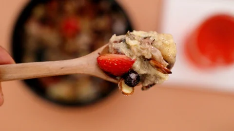 Close up shot of delicious bread pudding with fruits Stock Footage 128864003