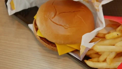 Close up shot of delicious double cheeseburger Stock Footage 323295027