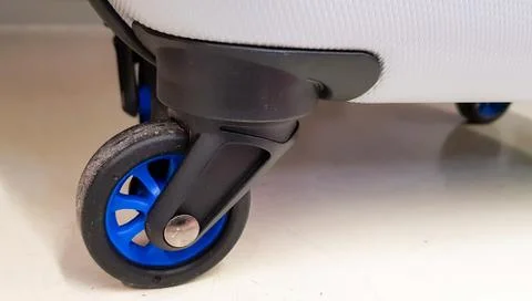 Close up shot detail of a very solid and reliable travel suitcase wheel Stock Photos