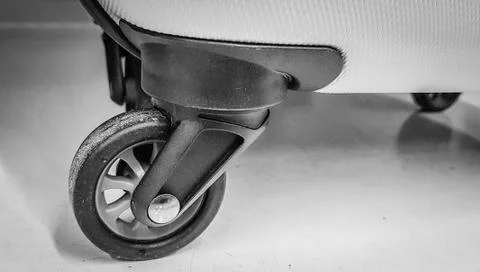 Close up shot detail of a very solid and reliable travel suitcase wheel Stock Photos