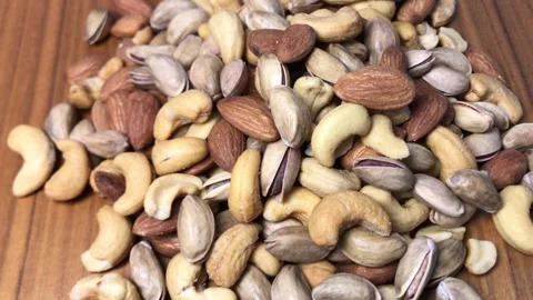 Close up shot of different nuts 스톡 동영상 241705822