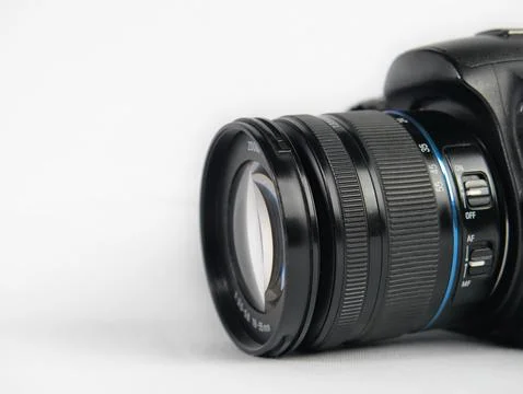 Close up shot of digital camera lens focus and zoom rings. White background Foto stock