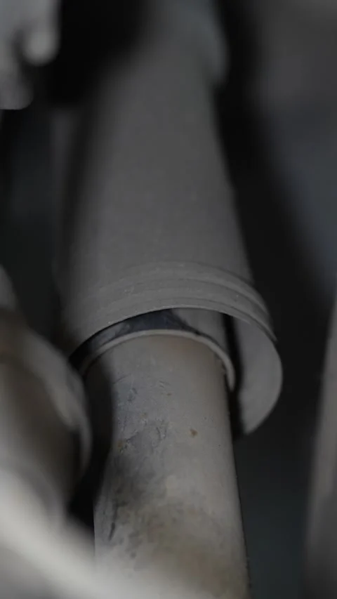 Close up shot of dirty car shock absorber with dust boot. Stock Footage 343755771